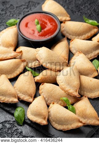 Margarita Margherita Pizza Parcels Pockets Filled With Tomato, Mozzarella Cheese And Basil Served On
