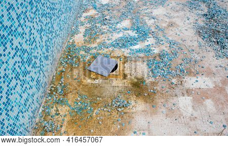 Worker Applies Waterproofing With A Small Brush