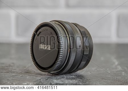 Russia, Krasnodar - April 2, 2021: Meike 25mm F1. 8 Lens For Micro Four Thirds Mirrorless Cameras
