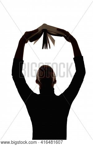 Female Silhouette. Self Education. Knowledge Wisdom. Dark Contrast Outline Portrait Of Relaxed Woman