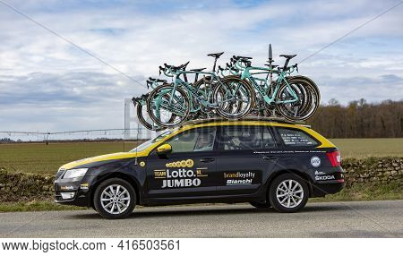 Fains-la-folie, France - March 5, 2018: The Technical Car Of Lottonl-jumbo Team Driving On A Country