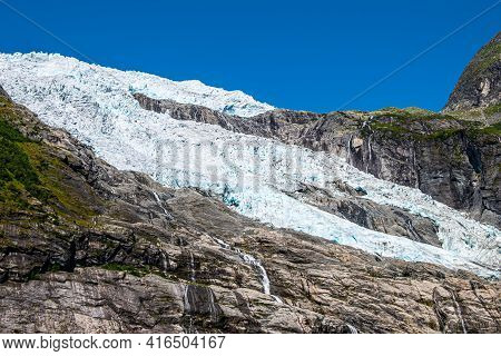 Briksdalsbreen Glacier In 2019, Jostedalsbreen National Park, Norway, Closeup Photo