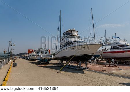 Pyeongtaek, South Korea; April 6, 2021: Rows Of Yachts Metal Storage Racks In Parking Lot Of Jeongok