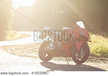 Krasnoyarsk, Russia - July 27, 2020: Red And Black Sportbike Honda Cbr 600 Rr 2005 Pc37 On Sunset.