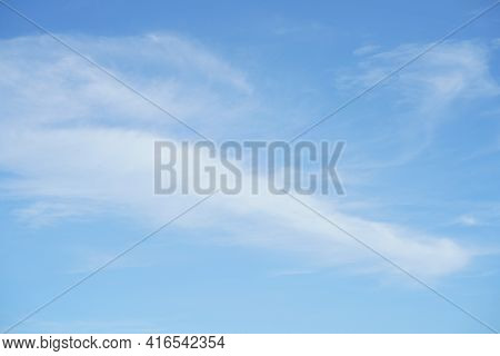 Hello Summer Sky Is Bright Blue. There Are Clouds Floating Through. Feel Relax When Looking. See The
