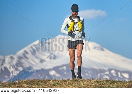 Man Travel Athlete In The Mountains In High Altitude