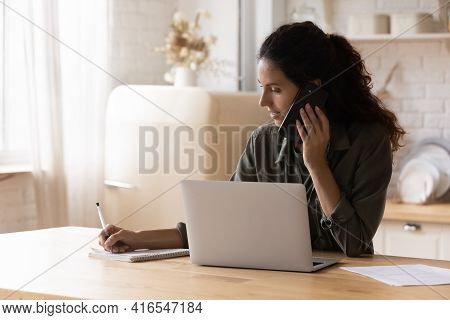 Confident Woman Making Phone Call, Taking Notes, Consulting Client