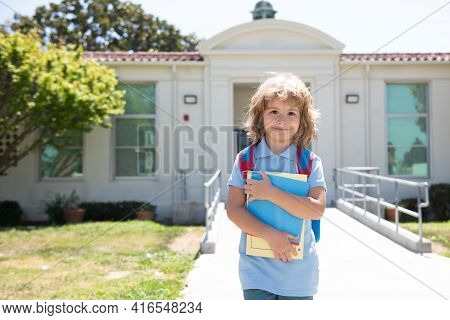 Knowledge Day. Portrait Of Kid Go To Study. Happy Childhood. Primary School Education