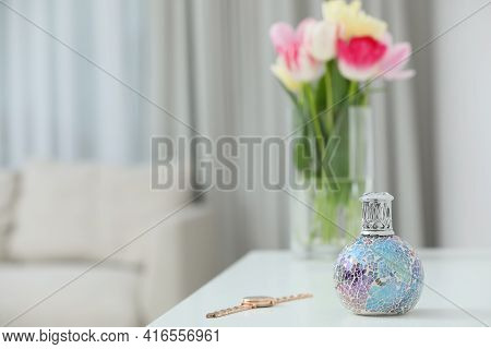 Burning Catalytic Purifying And Watch On White Table, Space For Text