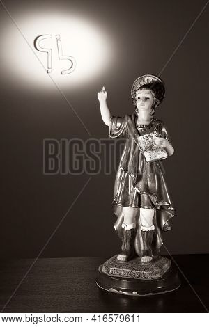 Saint Pancratius Knows The Answer. Visual Metaphor. Vertical Image.