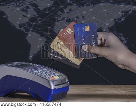 Young Business Showing All Credit Cards On Mobile Card Reader And Hand Entering Security Pin In Cred