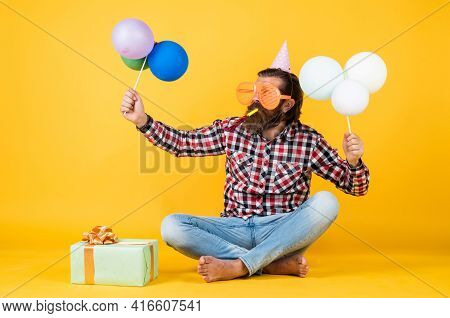Happy Birthday To You. Bearded Mature Man Celebrate Birthday Party. Cheerful Man In Bday Hat Hold Ho