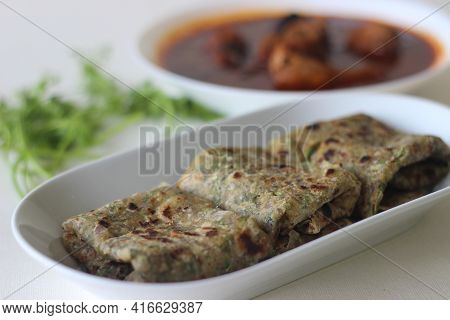 Indian Flat Bread Made Of Whole Wheat Flour With Grounded Flax Seed And Fresh Coriander Leaves Serve