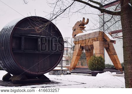 On The Street, A Large Wooden Keg And A Goat Figure Are Symbols Of Beer. Velke Popovice. Czech. Dece