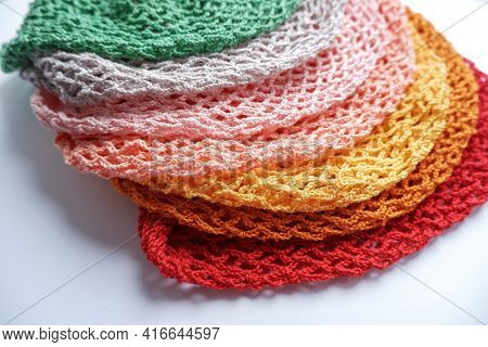 Colorful String Bags, Shopping Bag On A White Background, Photo From Above. Colorful String Bags, Co