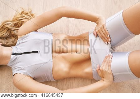 Young Pretty Woman Do Breathing Exercise. Home Sport Workout. Healthy Lifestyle. Long Blond Hair. Fe