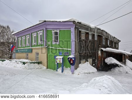 Visim, Russia - January 8, 2016. Country Street In Winter. Office Building Located In The Historical
