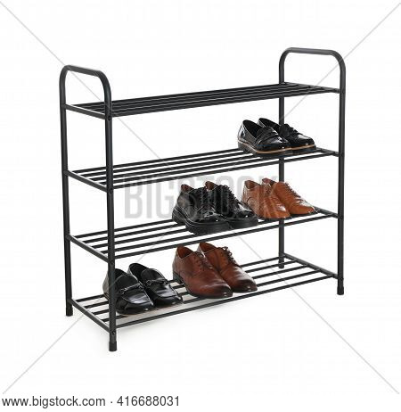 Stylish Shelving Unit With Different Pairs Of Shoes On White Background. Storage Idea