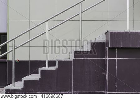 Stairs At The Entrance To The Building Upstairs View From The Side Of The Railing