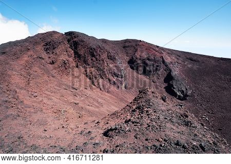 Mount Etna In Sicily Near Catania, Tallest Active Europe Volcano In Italy. Red And Purple Lava Field