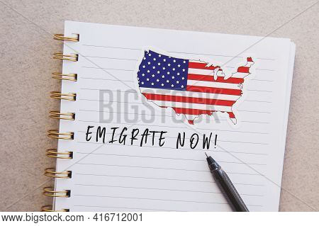 Notebook With American Flag And Country Map With Inscription Emigrate Now, Emigration Concept