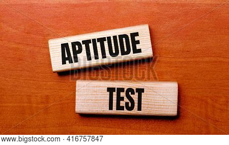 On A Wooden Table Are Two Wooden Blocks With The Text Question Aptitude Test
