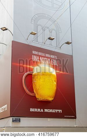 Milan, Italy - June 15, 2019: Big Beer Billboard Birra Moretti At Scaffolding In Milan, Italy.