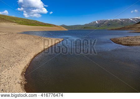 Spandaryan Reservoir In Armenia Under Blue Sky Background