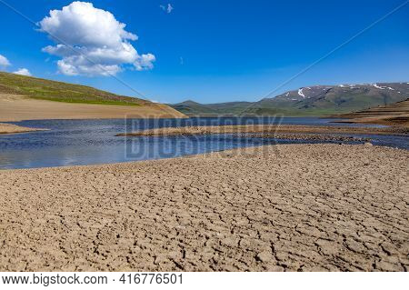 Spandaryan Reservoir In Armenia Under Blue Sky Background