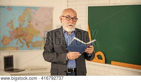 Back To School. Education In Retro School. Bearded Man Give Marks In Diary. Write Notes In Book. Sen