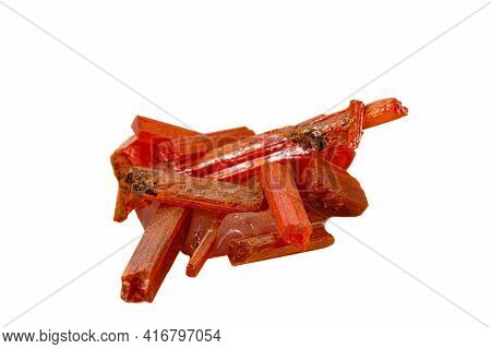 Macro Stone Crocoite Mineral On A White Background Close Up