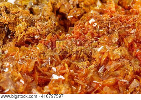 Macro Stone Mineral Wulfenite On A White Background