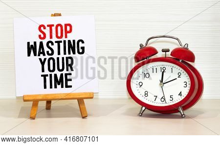 Don't Waste Your Time Motivational Concept Written On Easel.