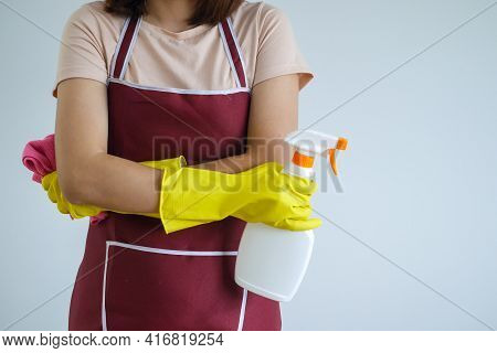 Close-up Of A Woman's Body With Cleaning Equipment.