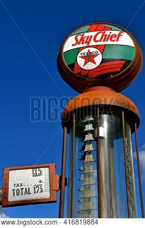 Ulen, Minnesota, April 9, 2021:the Old Gasoline Pump Advertises Sky Chief Gasoline Introduced By Tex
