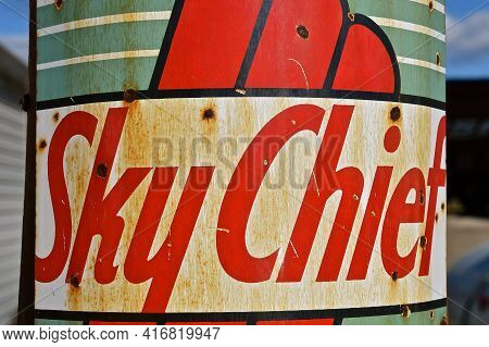 Ulen, Minnesota, April 9, 2021:the Old Gasoline Pump Advertises Sky Chief Gasoline Introduced By Tex