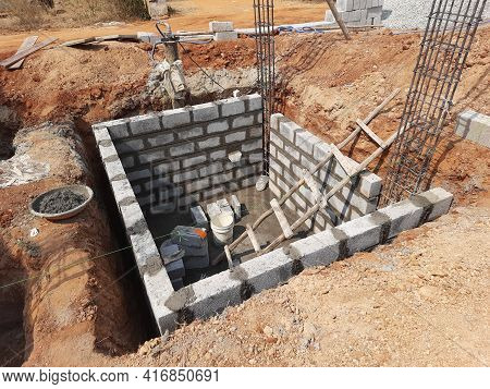 Closeup Of Construction Of New Building With Cement Block And M Sand Or Artificial Sand At Empty Fie