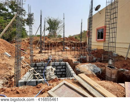 Closeup Of Construction Of Building Indian House With Pillar, Beam, Pit And Water Sump Construct Usi