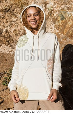 Beautiful woman in cool design hoodie winter fashion outdoor shoot close up