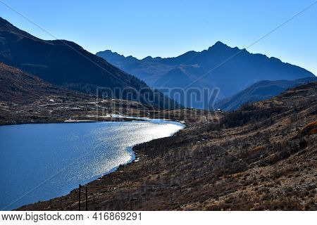Picturesque View Of Blue Lake In Himalyan Mountain Of Sikkim