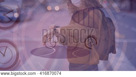 Mid-section of caucasian women looking at her watch with clock digital background. digitally generate image.