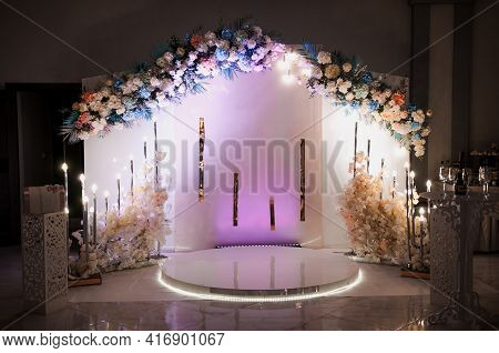 Wedding Arch With Multi-colored Flowers. Wedding Decorations