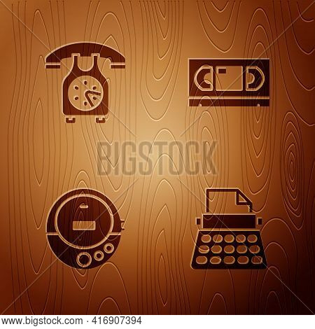 Set Retro Typewriter, Telephone Handset, Music Cd Player And Vhs Video Cassette Tape On Wooden Backg