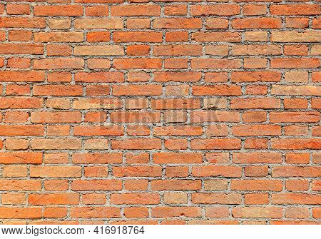 Wall Made With Red Bricks And Mortar