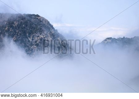 Mountain Peaks Above Coastal Stratus Clouds Known As The Marine Layer Taken At The San Gabriel Mount