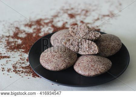 Steamed Cakes Made With Finger Millets And Skinned Black Gram. Locally Known As Ragi Idli.