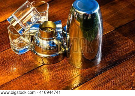Bar Ustensils, Drink Concept. Cocktail Shaker Accessories On A Wooden Board.