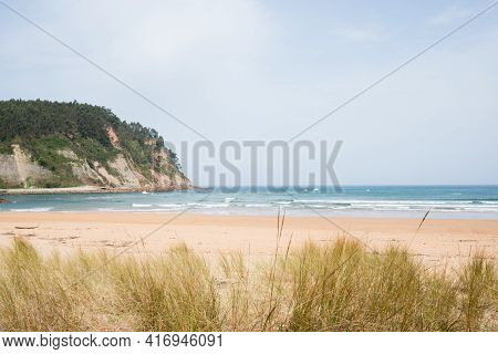 Beautiful Wiew Of Rodiles Beach With No People On A Spring Summer Day. Asturias