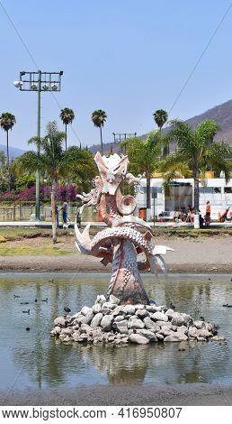 Jocotepec, Mexico - April 4 2021: Vertical View Of The Quetzalcoatl Statue On The Jocotepec Boardwal