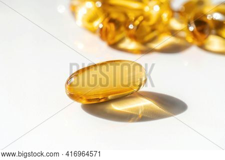 Oil Filled Capsules On The White Background